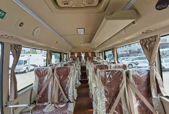 Diesel Coach Coaster Bus 30 Kursi Van Bus 140hp Transmisi Manual Kulkas Kondisi Udara